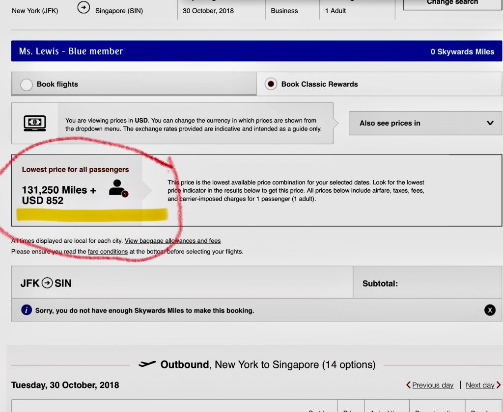 Emirates Skyward miles required plus taxes and fees for an Emirates Business Class flight from JFK to Dubai to Singapore