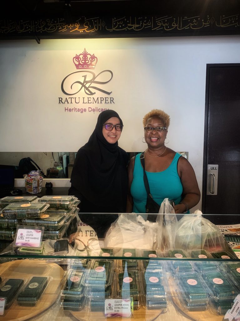 Aliya, owner of Ratu Lemper in Singapore, poses with me during my Kampong Glam Tour with the bitemojo app - image taken with an iPhone XS