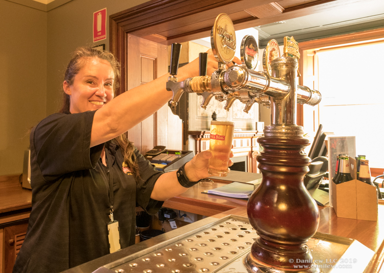 Bartender at James Boag Brewery in-house bar pouring a beer on tap - image taken by DaniLew LLC with a Nikon D500 and Nikon 16-80 lens