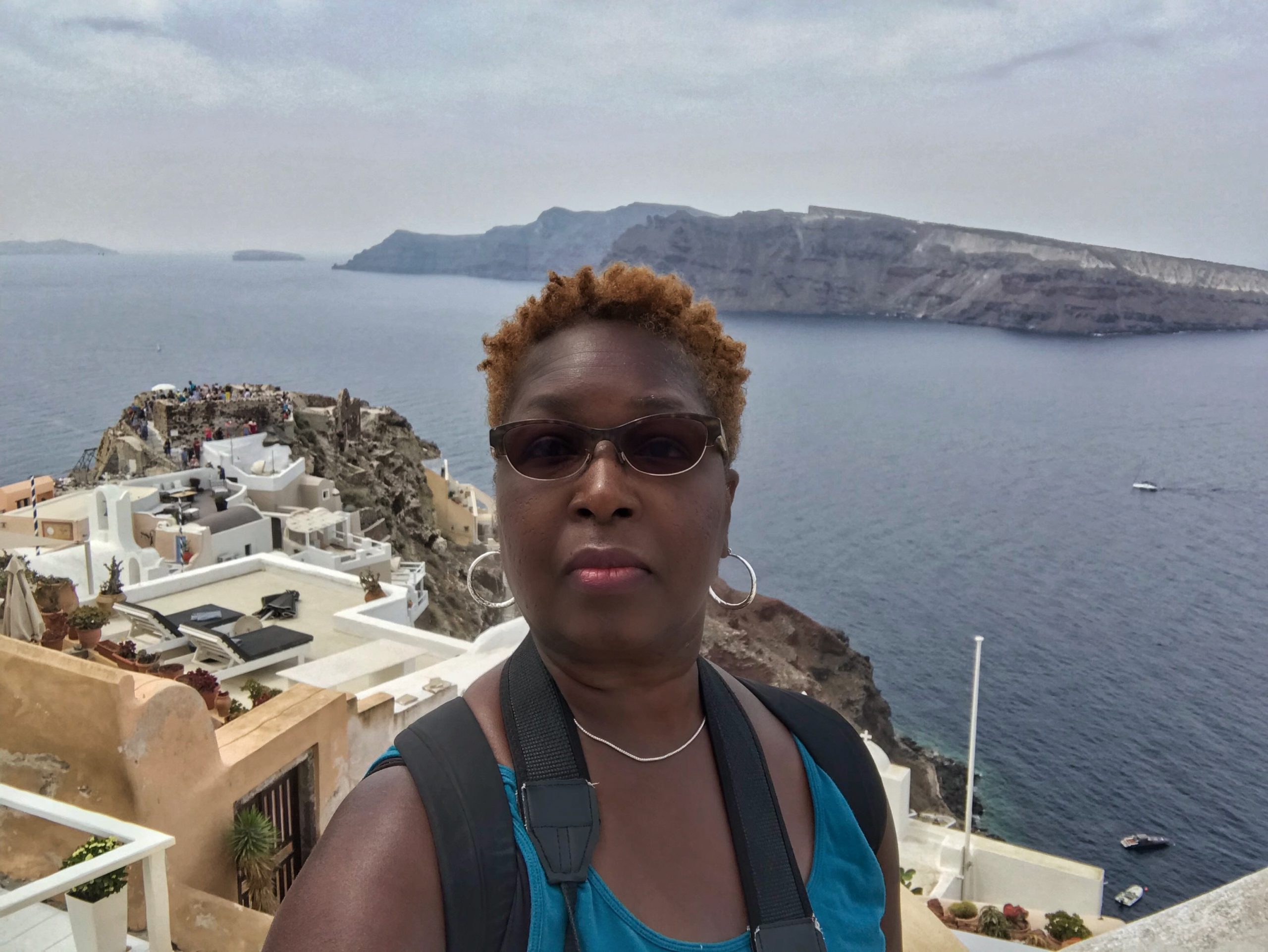 Danielle Lewis, owner of SelfishMe Travel LLC, in Oia, Santorini, Greece - image taken with an iPhone 7
