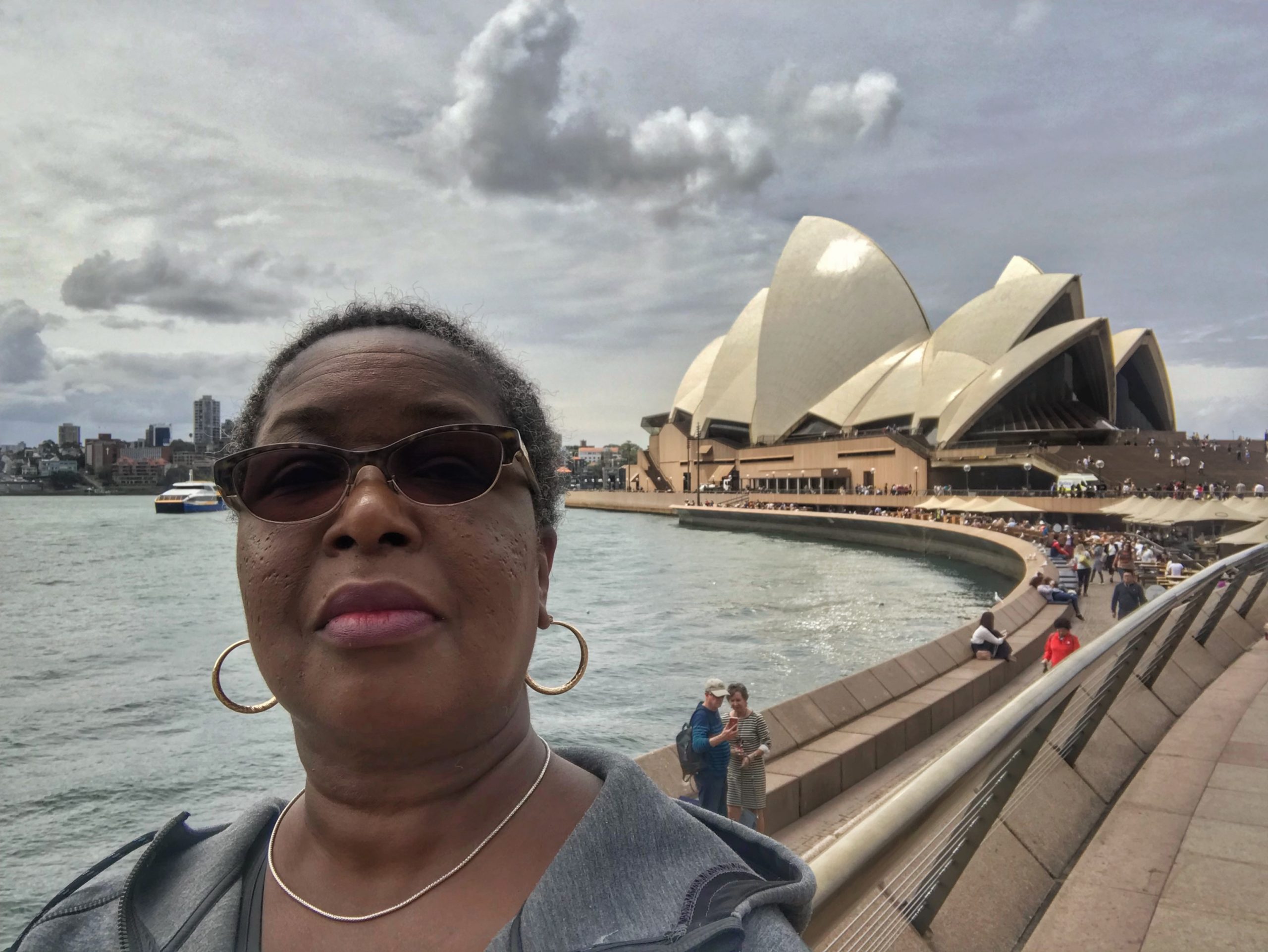 Danielle Lewis, owner of SelfishMe Travel LLC, at the Sydney Opera House in Sydney, Australia - image taken with an iPhone 7