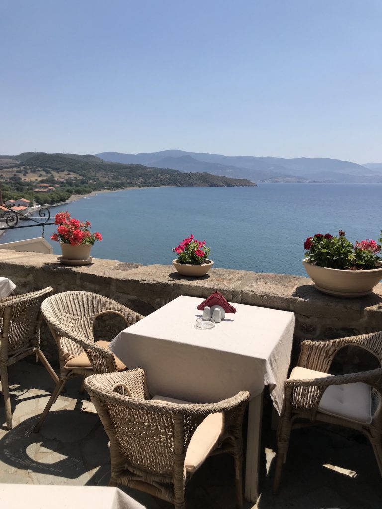 Seaside cafe in Mithymna on the Island of Lesvos, Greece as shown on SelfishMe Travel LLC