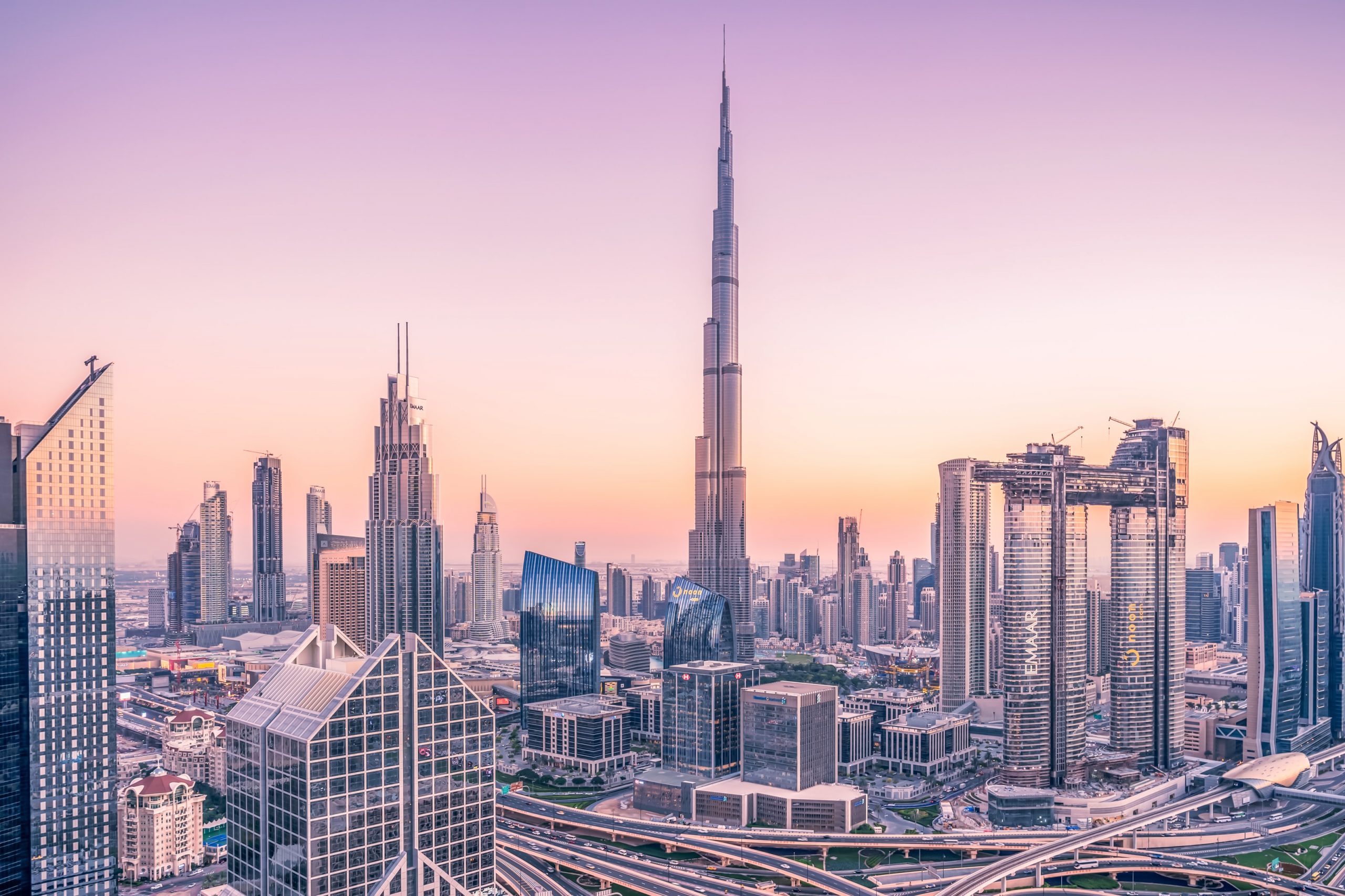 Dubai pink sunrise skyline on SelfishMe Travel blog post