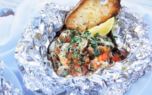 SelfishMe Travel blog post - Grilled Seafood Packet – Shrimp & Clams with White Wine, Herbs, and Garlic Toast on Olives and Lamb website - National Wine Day