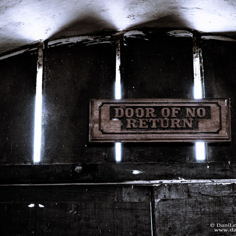 Door of No Return sign from Cape Coast Slave Castle in Ghana on the Slow Traveling Soul Sister podcast log